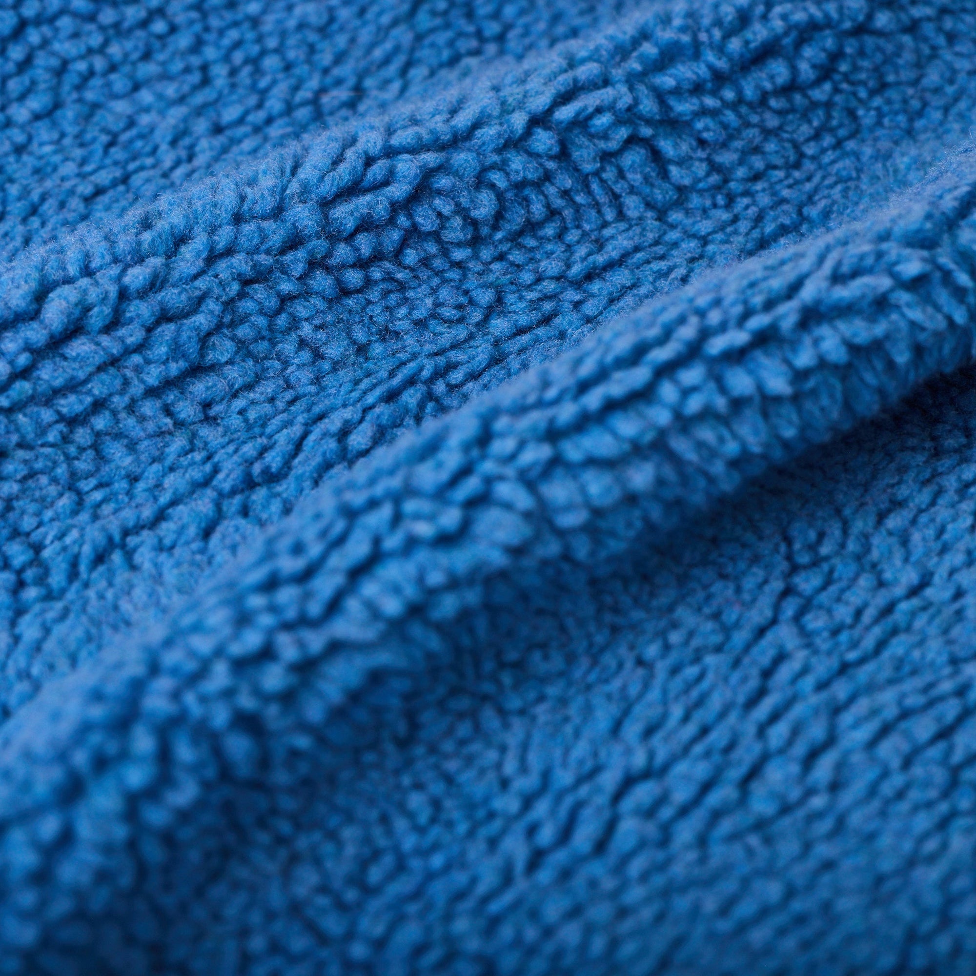 Close-up of the sherpa fleece top of the Colorado Sky colored My Place