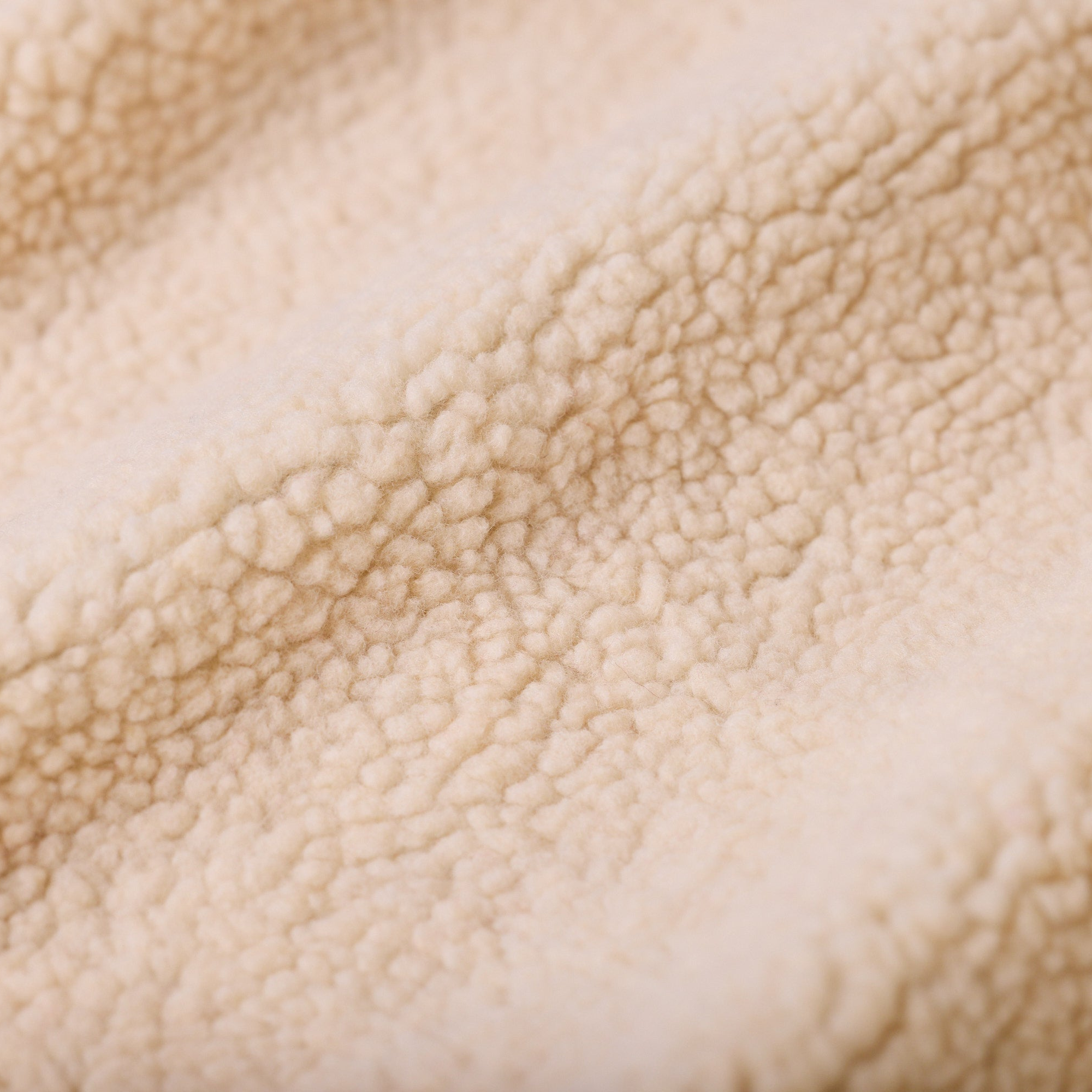 Close-up of the creme brulee My Place sherpa fleece top