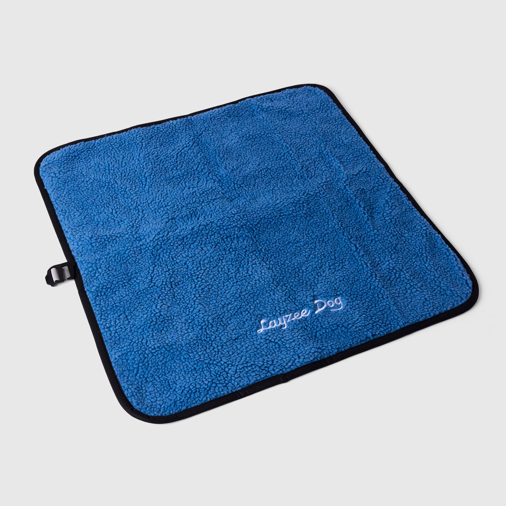 A small My Place dog bed in Colorado Sky color on a light grey background