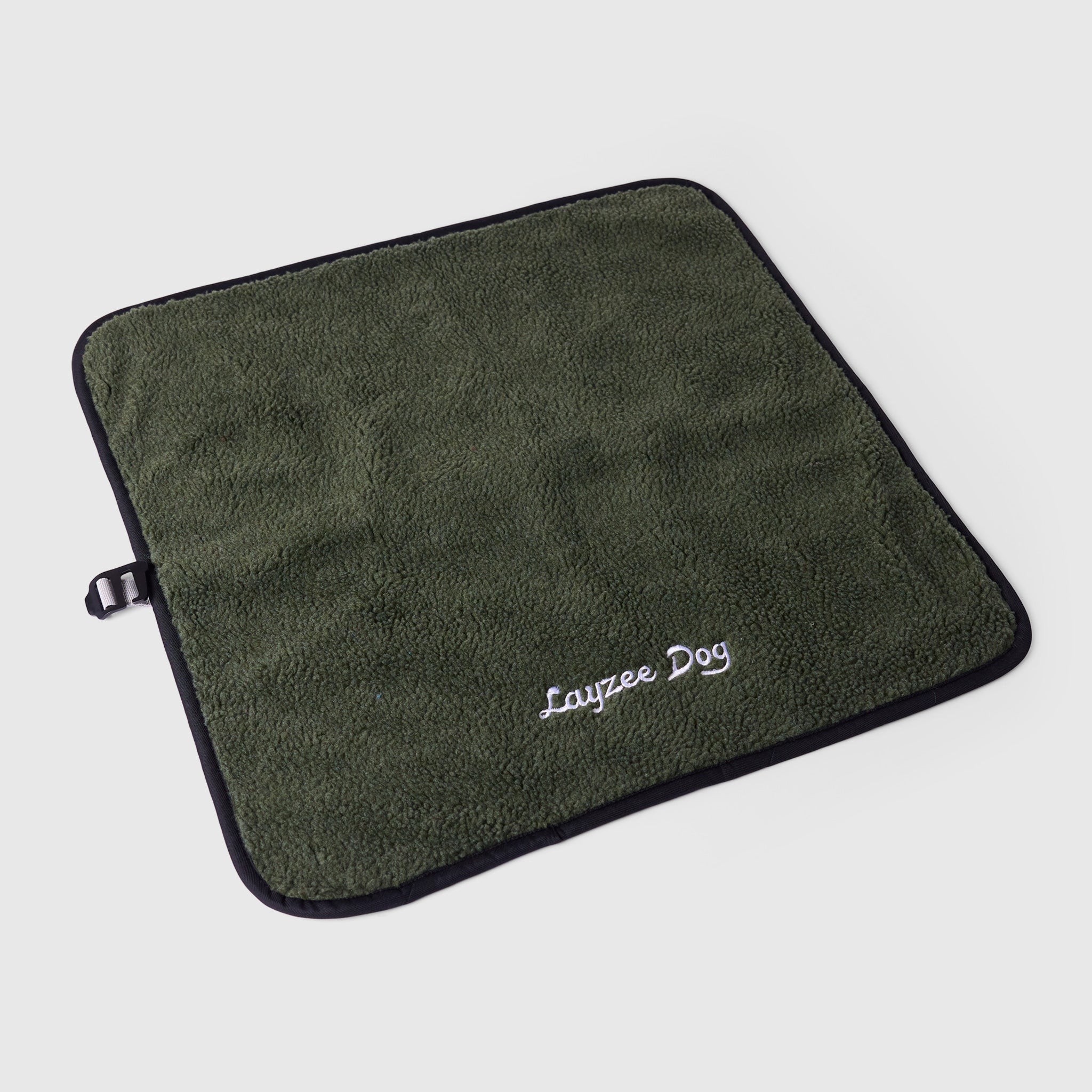 A small My Place dog bed in Ponderosa Pine color on a light grey background