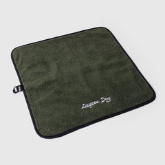 A small My Place dog bed in Ponderosa Pine color on a light grey background